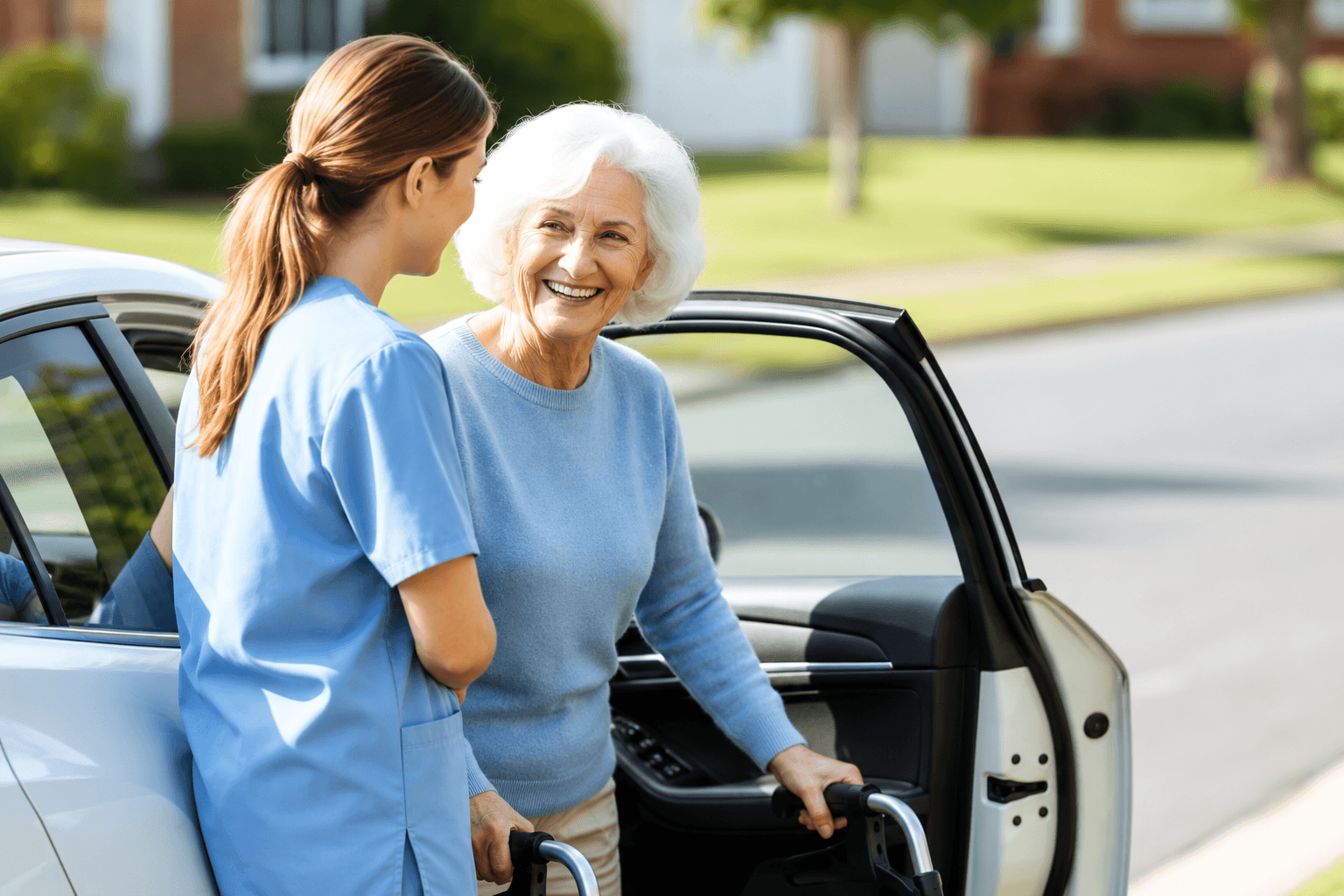 Caregiver helping an older adult step from a car with a walker